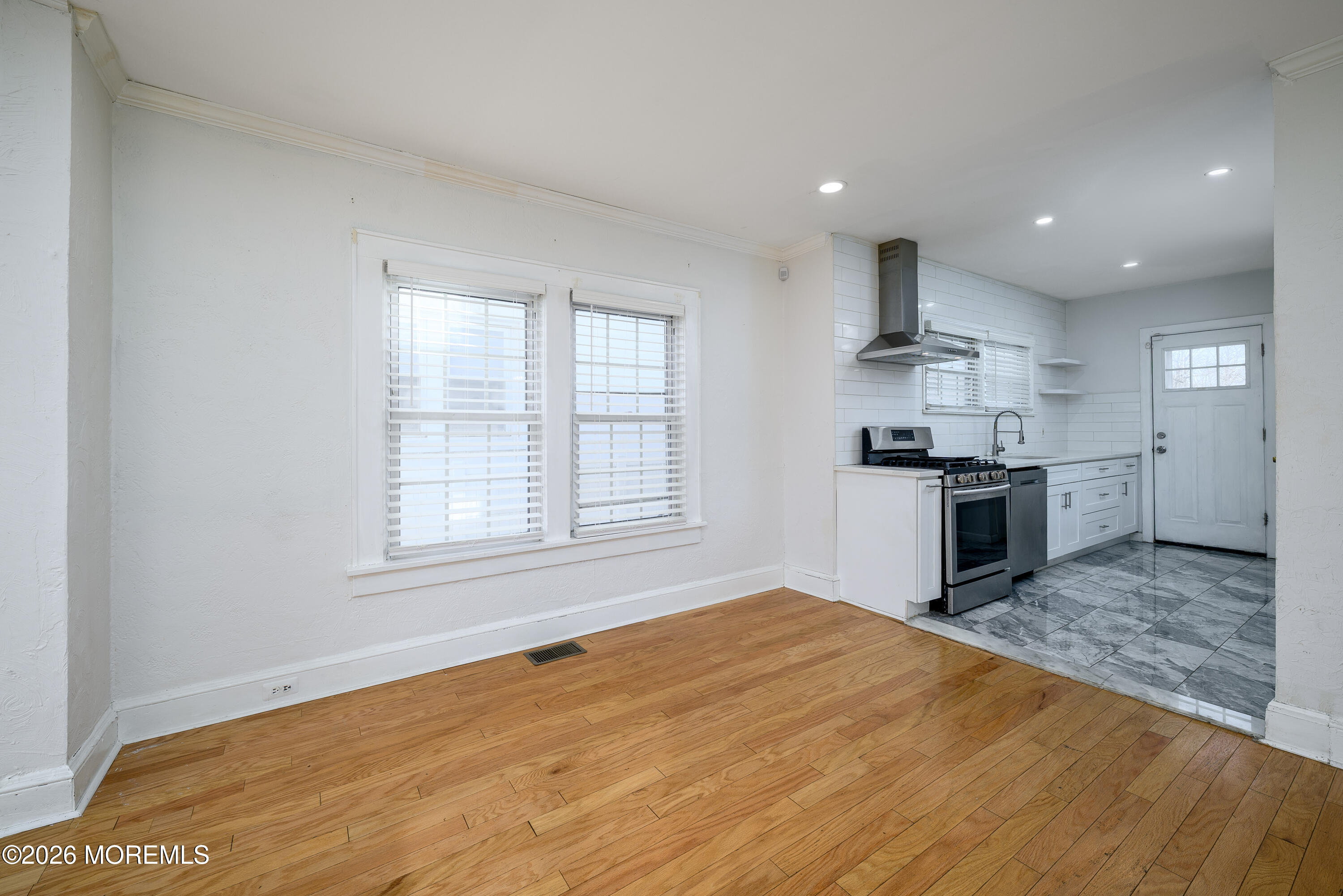 154 Lower Main Street Aberdeen, NJ 07747 - Photo 6 of 22 a view of a kitchen with a stove top oven