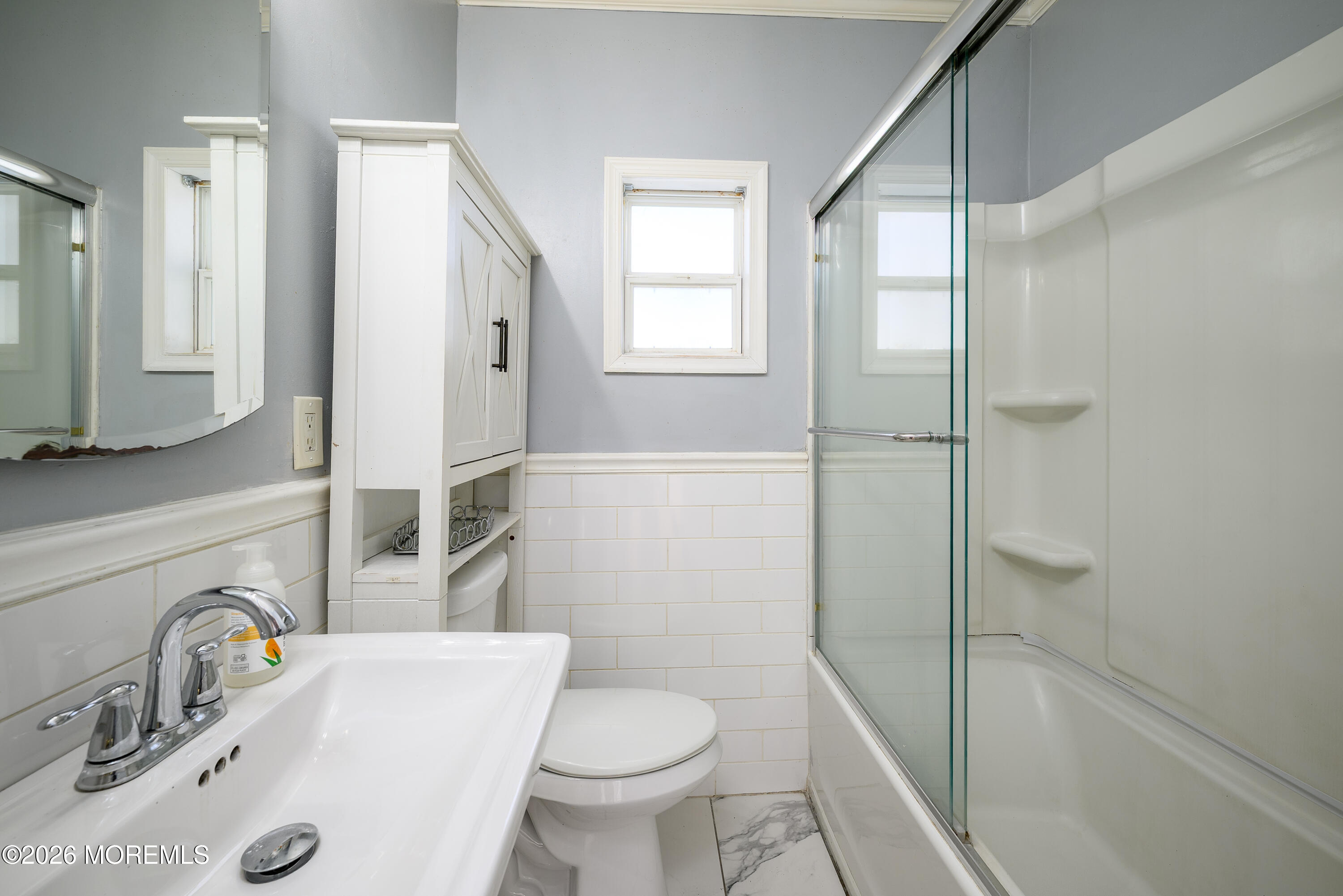 154 Lower Main Street Aberdeen, NJ 07747 - Photo 10 of 22 a bathroom with a sink toilet and shower