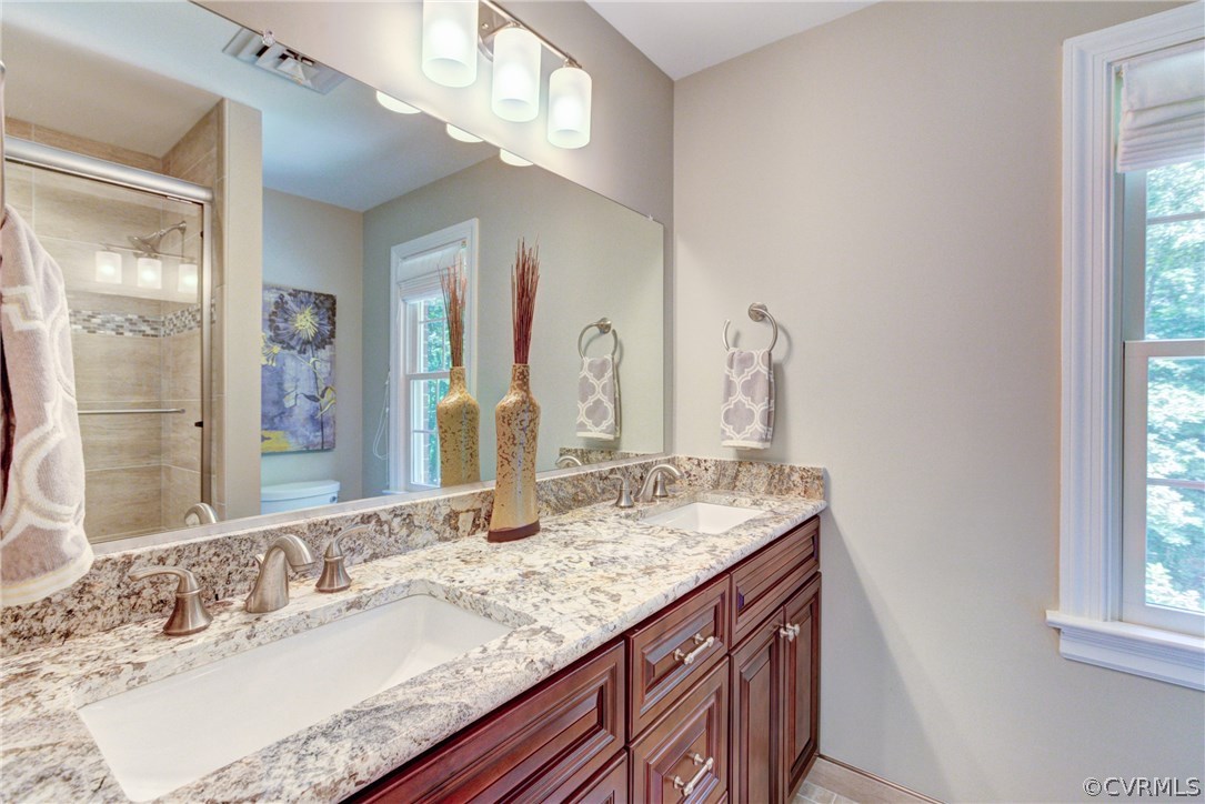 13311 South Chester Road Chester, VA 23831 - Photo 24 of 31 Hall bath with comfort height double vanity with g