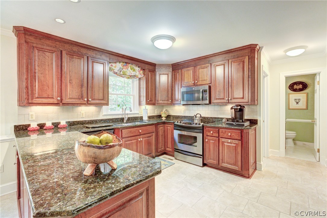 13311 South Chester Road Chester, VA 23831 - Photo 8 of 31 Custom cherry cabinets with "pull outs" and fabulo