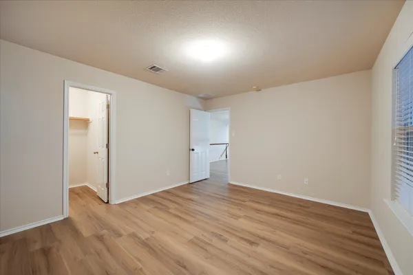 a view of an empty walk in closet