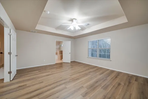 a view of room with racks on the wall