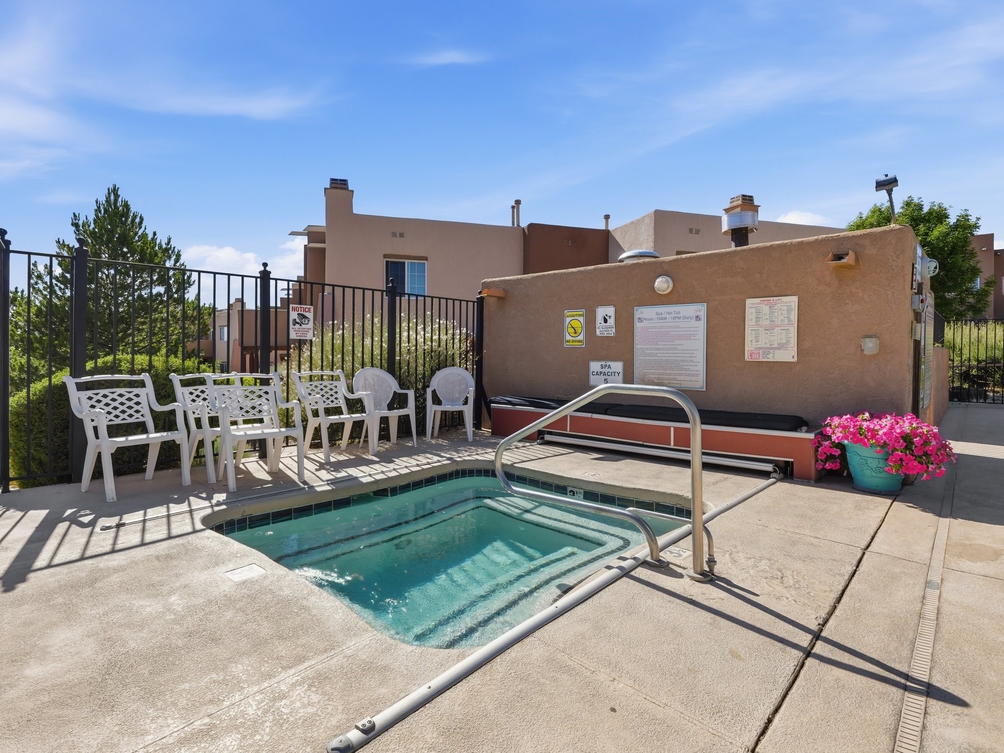 2210 Miguel Chavez Road, Unit 411 Santa Fe, NM 87505 - Photo 49 of 59 Hot tub within the community