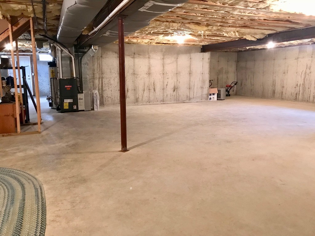 408 Nicholas Drive Lancaster, MA 01523 - Photo 27 of 30 a view of a room with gym equipment