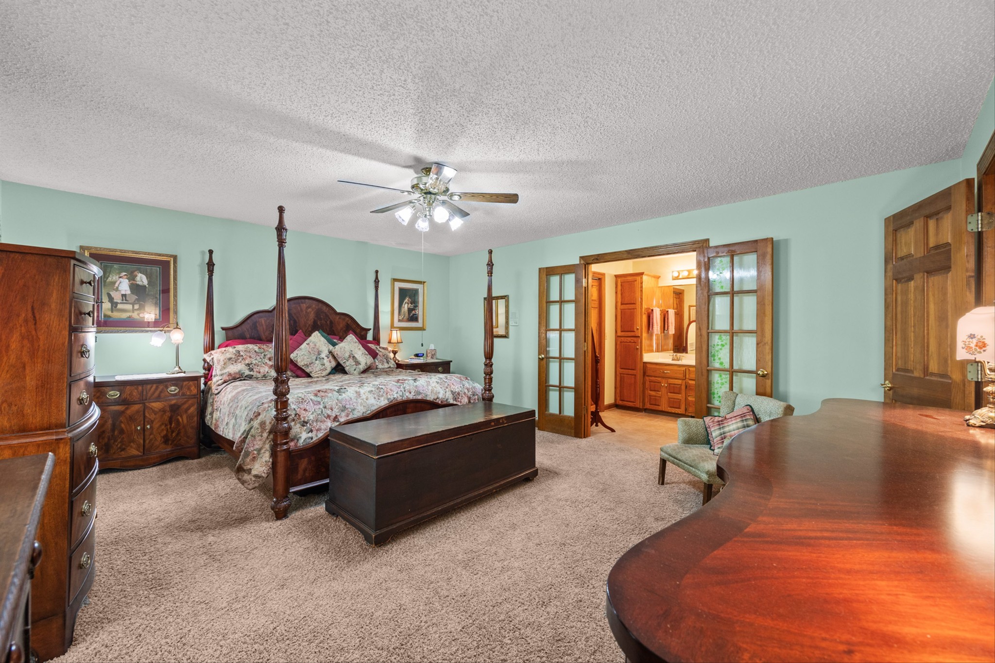 28301 Lambert Road Ardmore, AL 35620 - Photo 13 of 47 a bed room with a bed and a chandelier