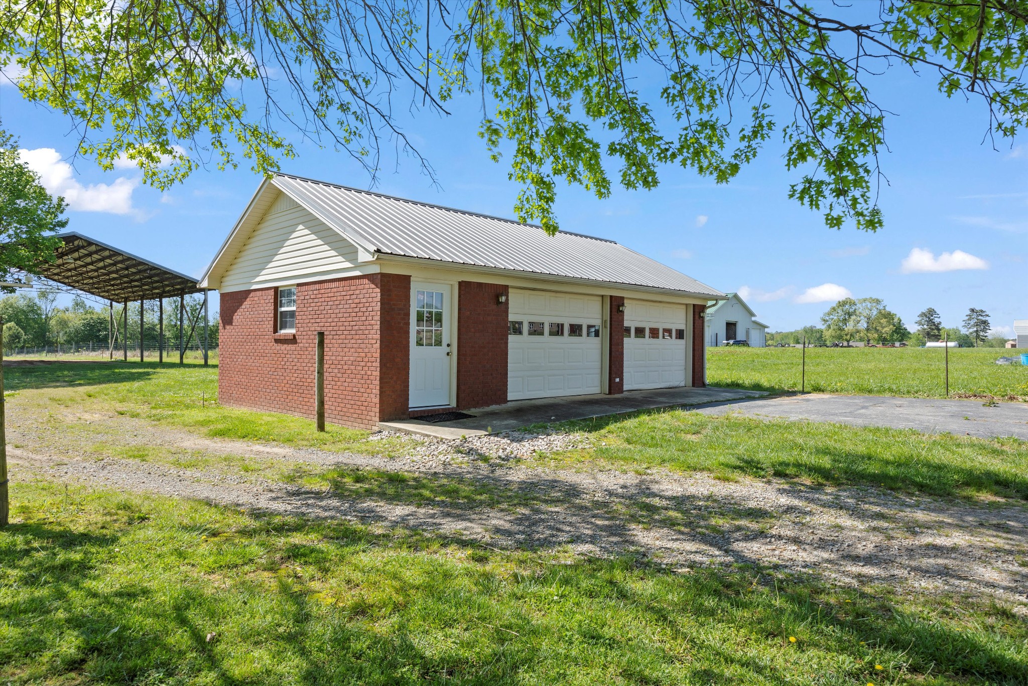 28301 Lambert Road Ardmore, AL 35620 - Photo 27 of 47 a view of a house with backyard and tree