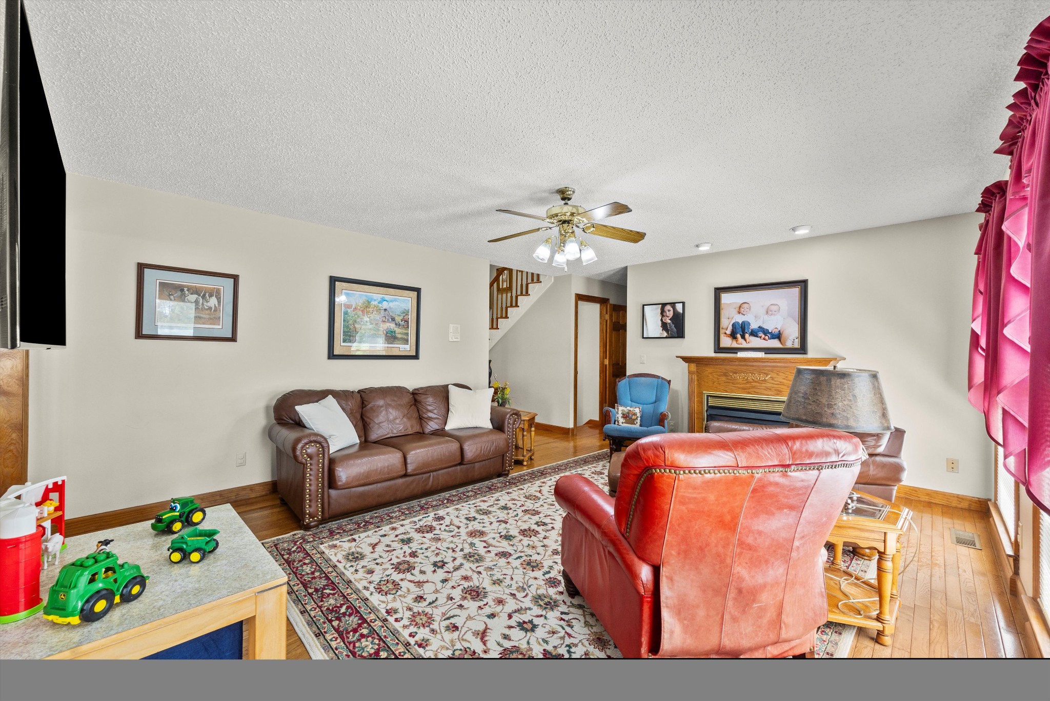 28301 Lambert Road Ardmore, AL 35620 - Photo 6 of 47 a living room with fireplace furniture and a wooden floor