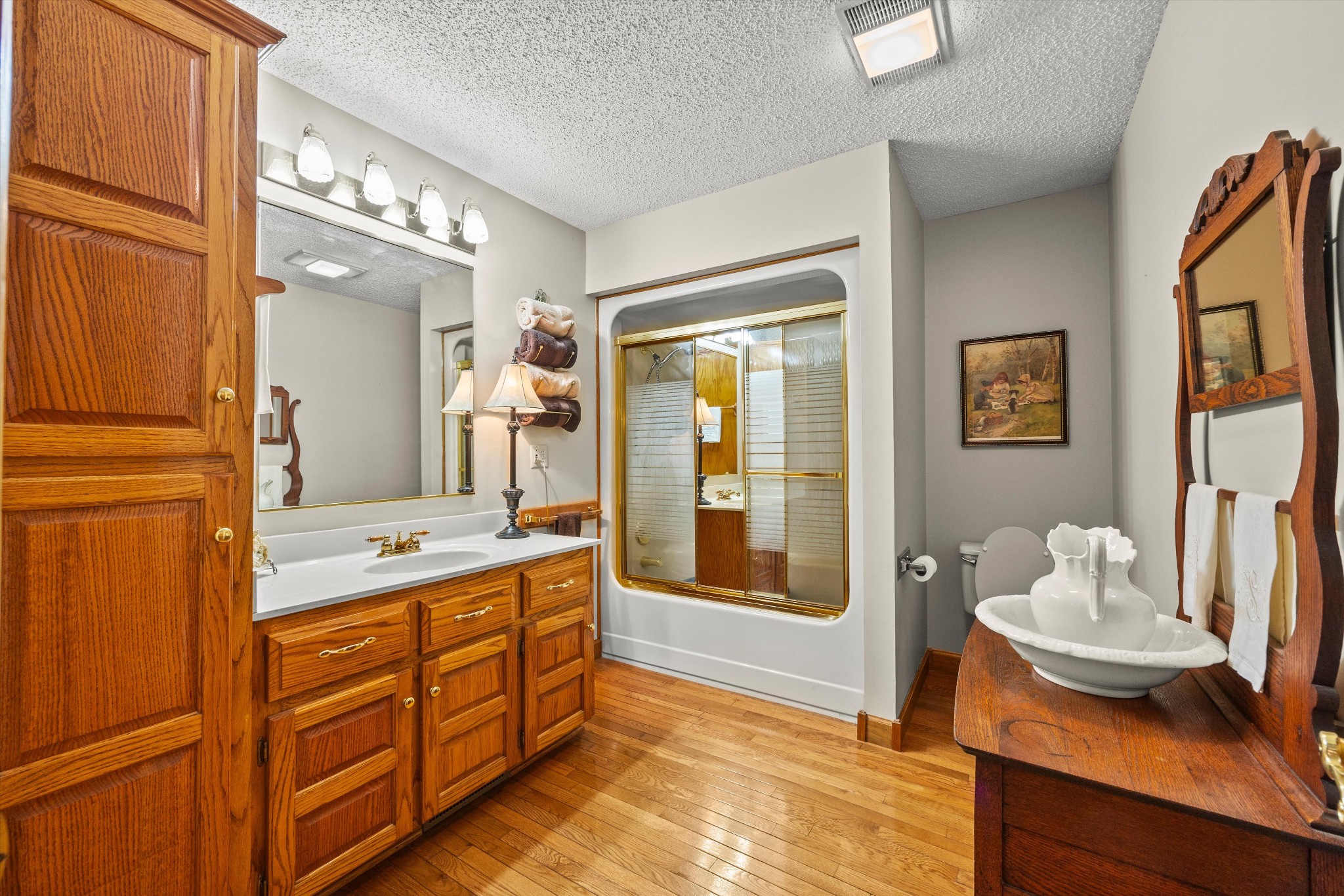 28301 Lambert Road Ardmore, AL 35620 - Photo 9 of 47 a spacious bathroom with a granite countertop sink and a mirror