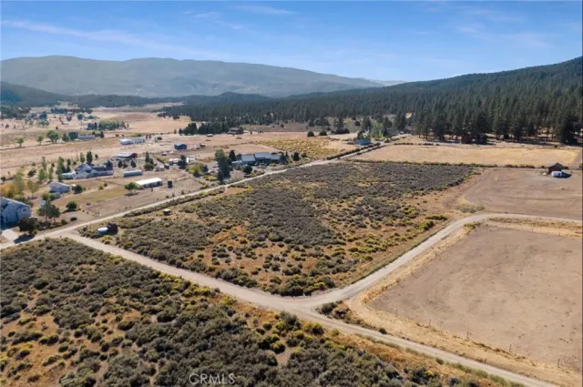 a view of a backyard of a house