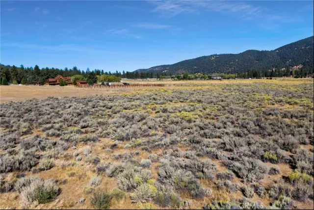 a view of lake with mountain in the background