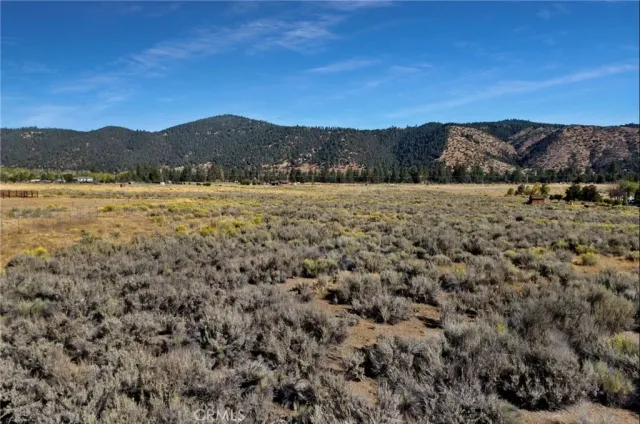 a view of mountain and sunset