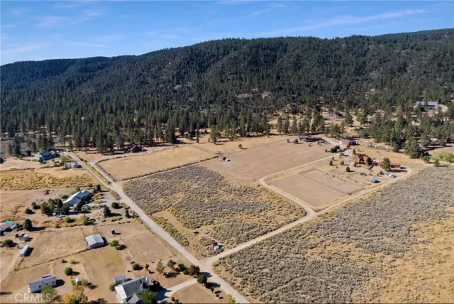 a view of a backyard of a house
