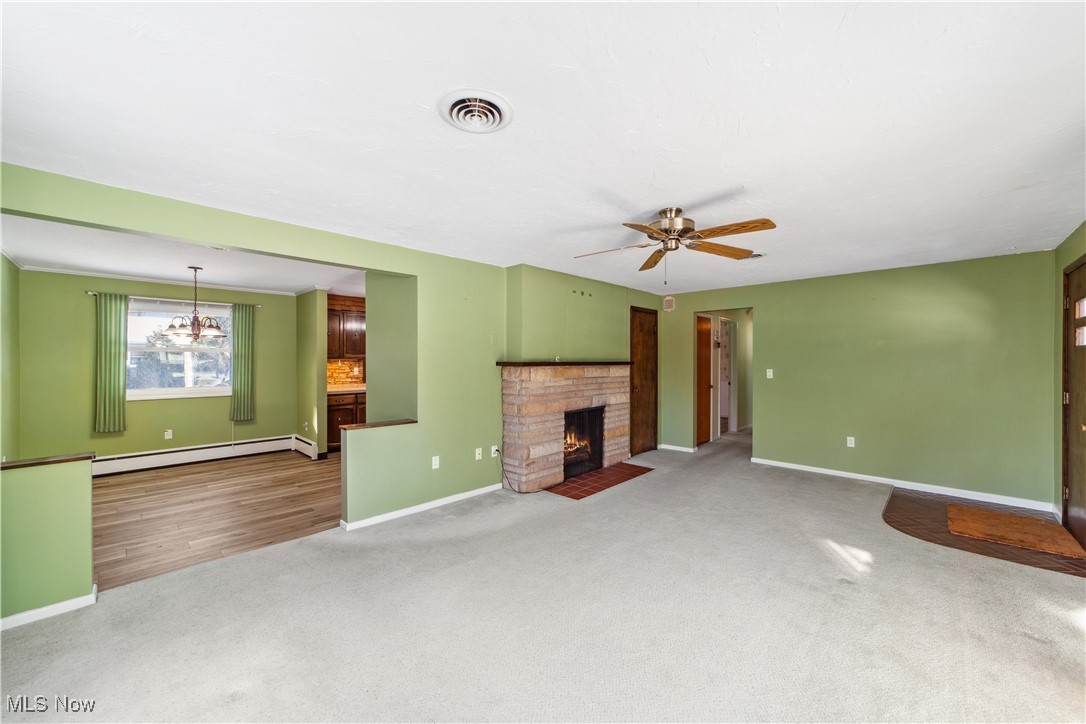 230 Fairfield Road Avon Lake, OH 44012 - Photo 4 of 40 Unfurnished living room which opens up to the dining area