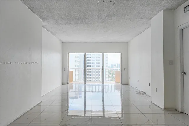 a view of an empty room with window