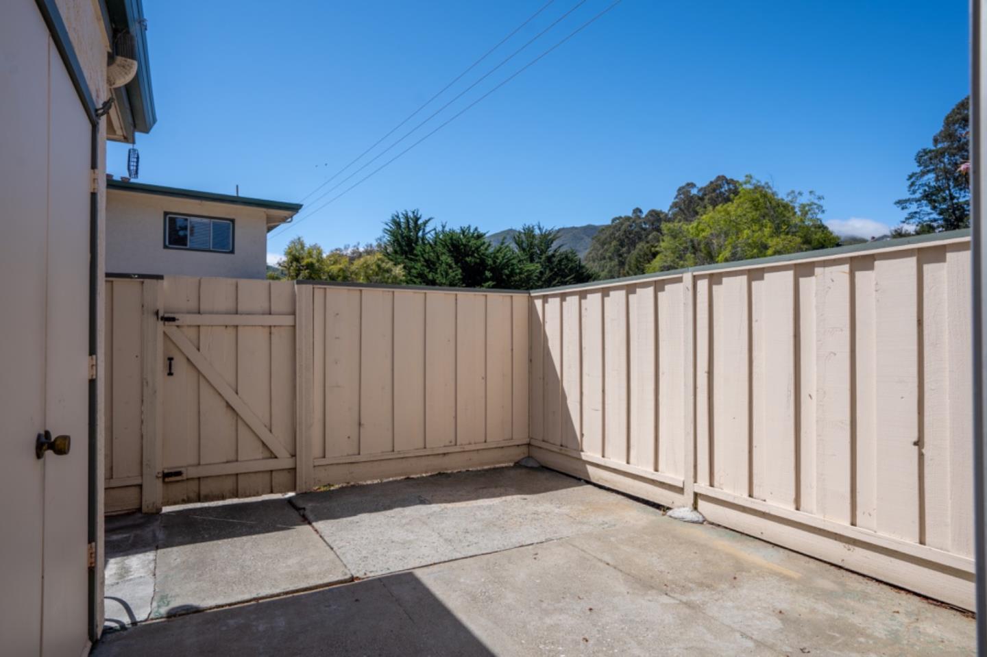 1130 Terra Nova Boulevard Pacifica, CA 94044 - Photo 11 of 15 a view of a wooden door in a backyard