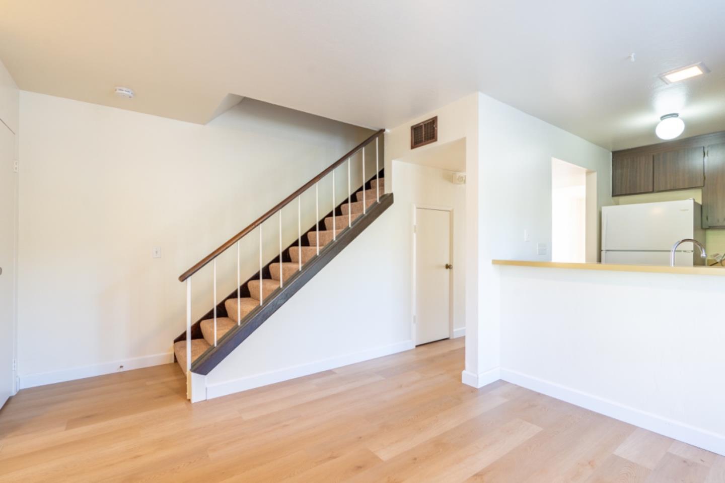 1130 Terra Nova Boulevard Pacifica, CA 94044 - Photo 4 of 15 a view of entryway and hall with wooden floor