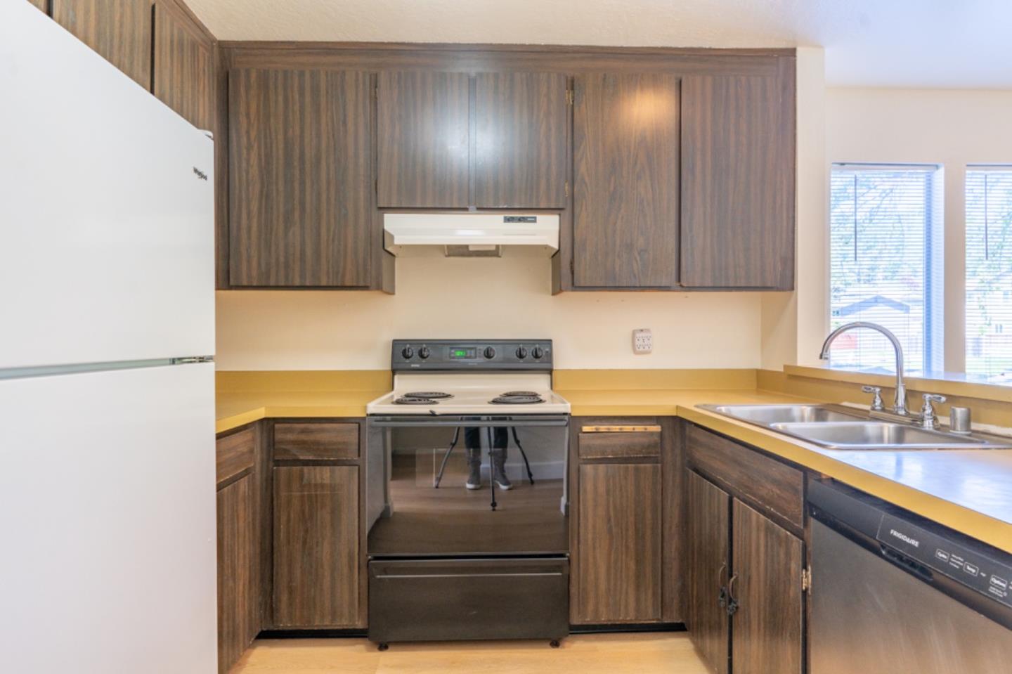 1130 Terra Nova Boulevard Pacifica, CA 94044 - Photo 8 of 15 a kitchen with a stove and a sink