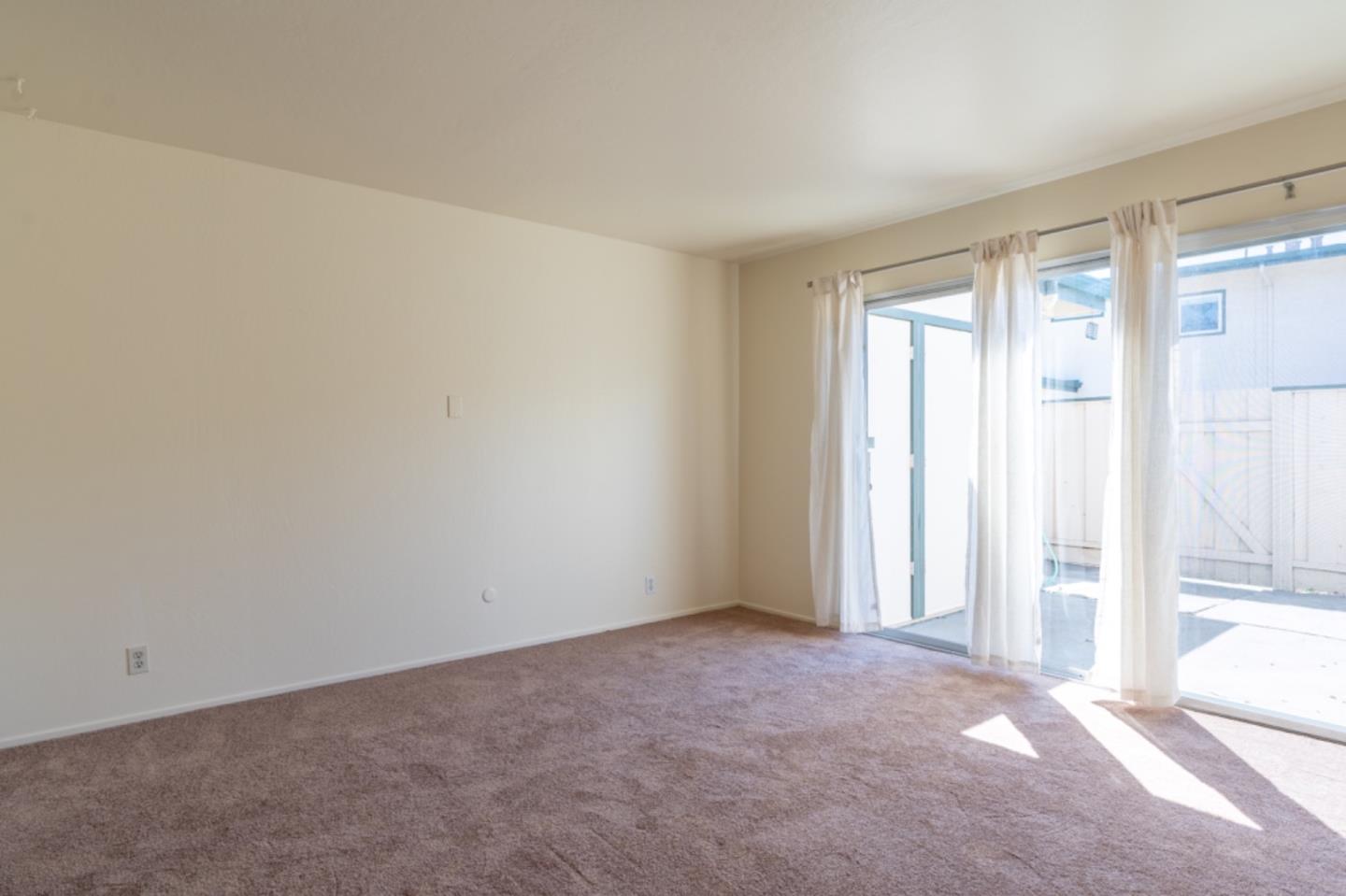 1130 Terra Nova Boulevard Pacifica, CA 94044 - Photo 10 of 15 a view of an empty room with a window