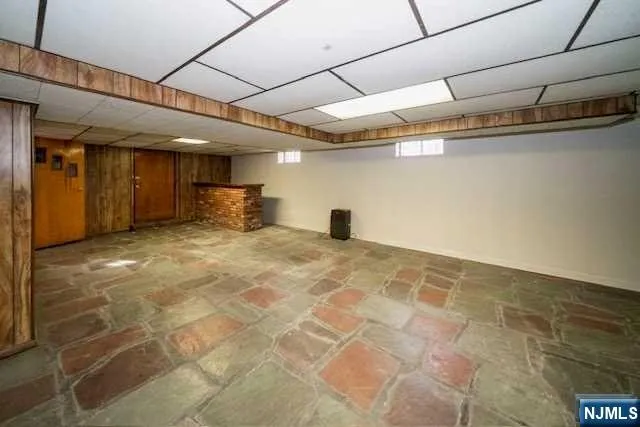 a view of a livingroom with wooden floor