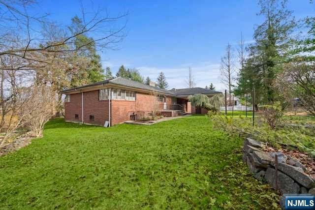35 Old Dock Road Alpine, NJ 07620 - Photo 22 of 23 a view of a house with backyard and garden