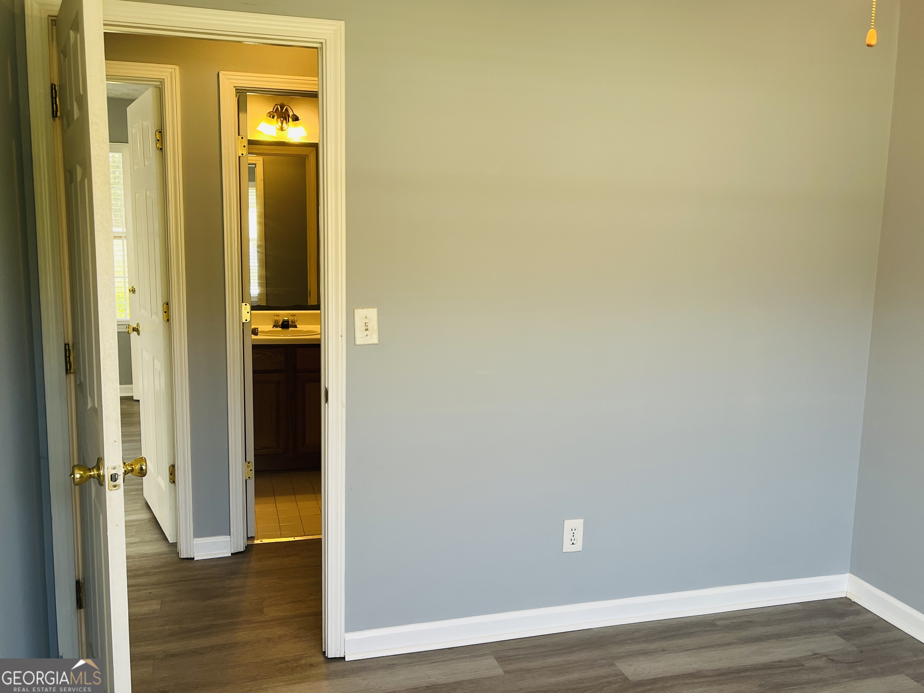 405 Peeks Crossing Drive Senoia, GA 30276 - Photo 12 of 31 a view of a bathroom with wooden floor