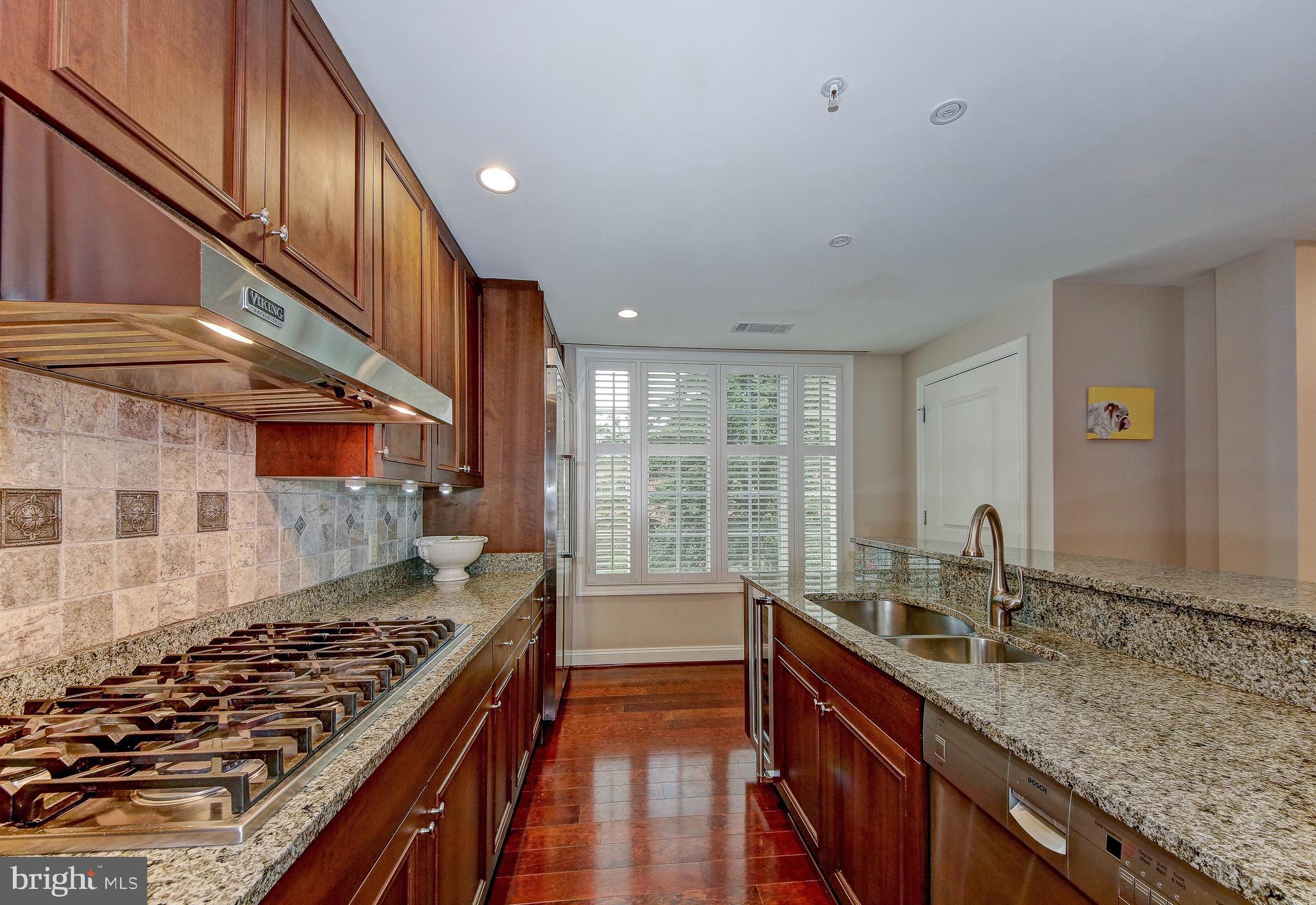 2501 Wisconsin Avenue Northwest, Unit 108 Washington, DC 20007 - Photo 13 of 31 Kitchen with Pantry Closet