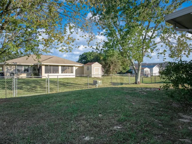 a house view with a garden space