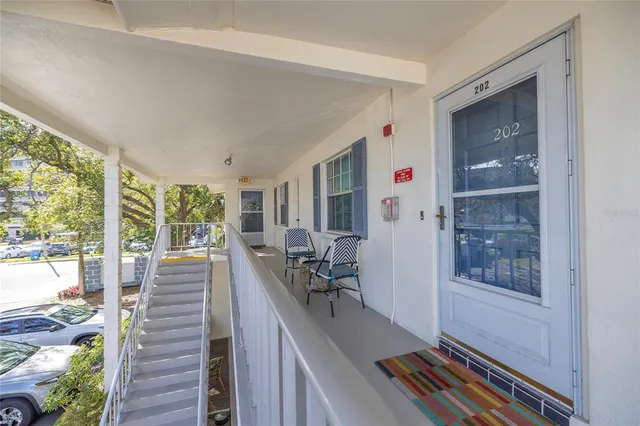 a view of a car parked in front of a building