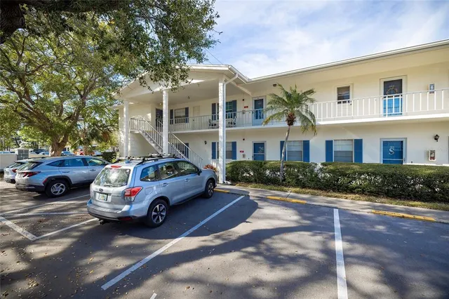 a cars parked in front of a house