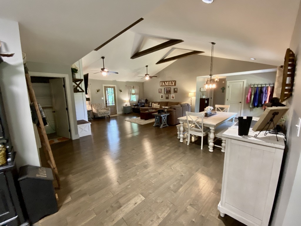 560 Butler Bridge Road Portland, TN 37148 - Photo 2 of 26 a living room with lots of furniture and gym equipment