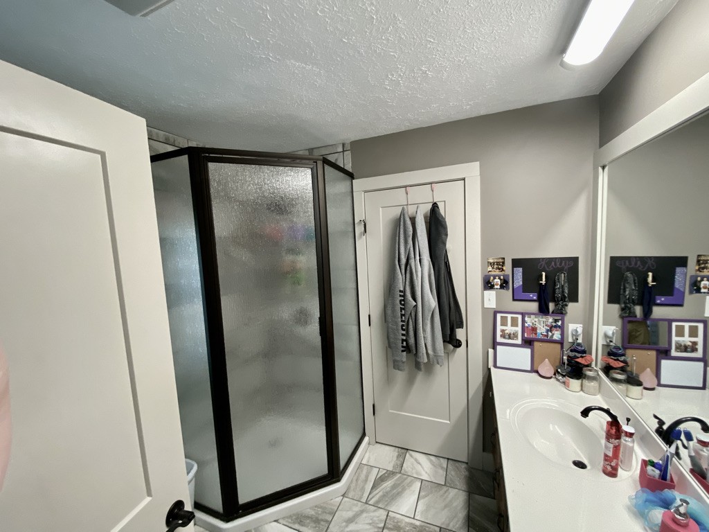 560 Butler Bridge Road Portland, TN 37148 - Photo 15 of 26 a view of a refrigerator in kitchen and a sink