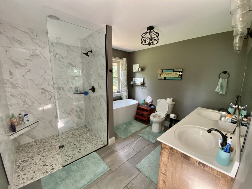 560 Butler Bridge Road Portland, TN 37148 - Photo 9 of 26 a bathroom with a sink toilet and shower