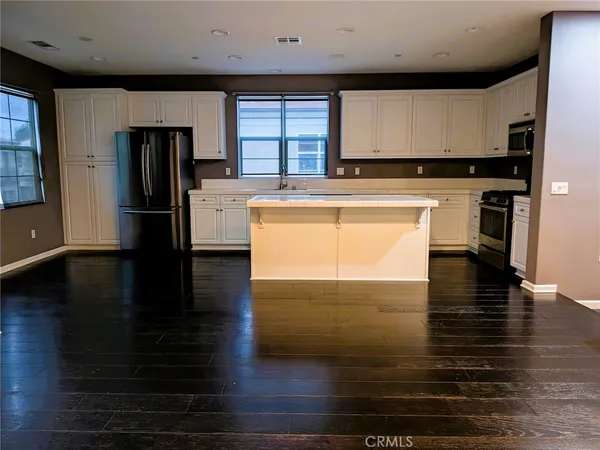 a view of kitchen and natural light