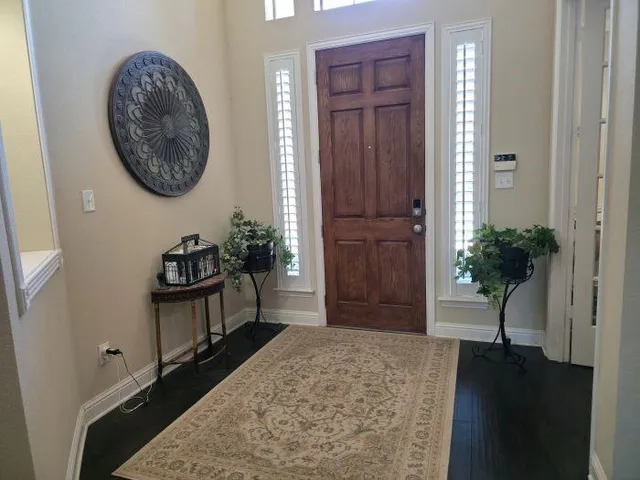 a view of a hallway with entryway