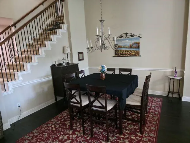 a view of a dining room with furniture