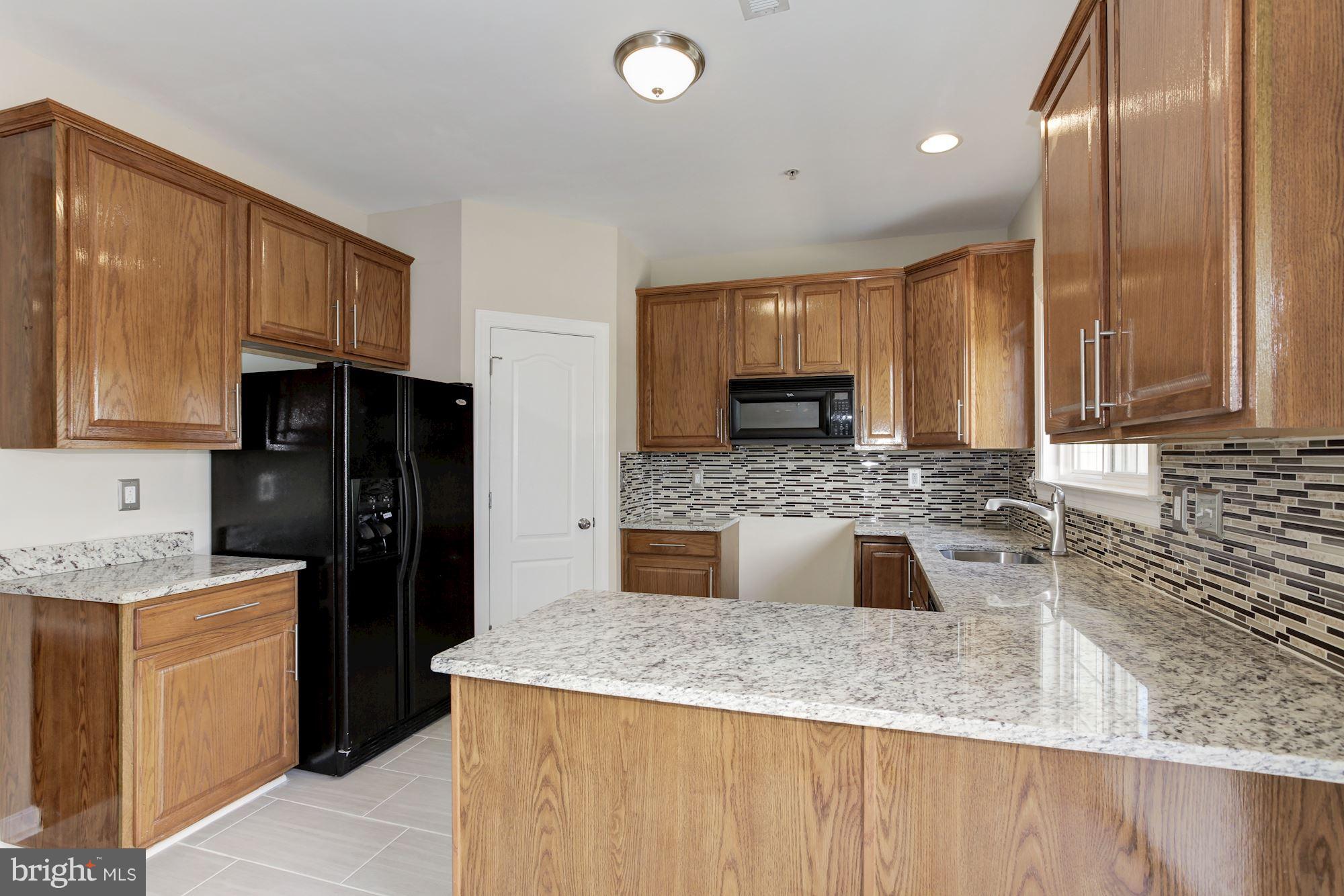 3342 Castle Ridge Circle, Unit 5 Silver Spring, MD 20904 - Photo 14 of 29 Kitchen
