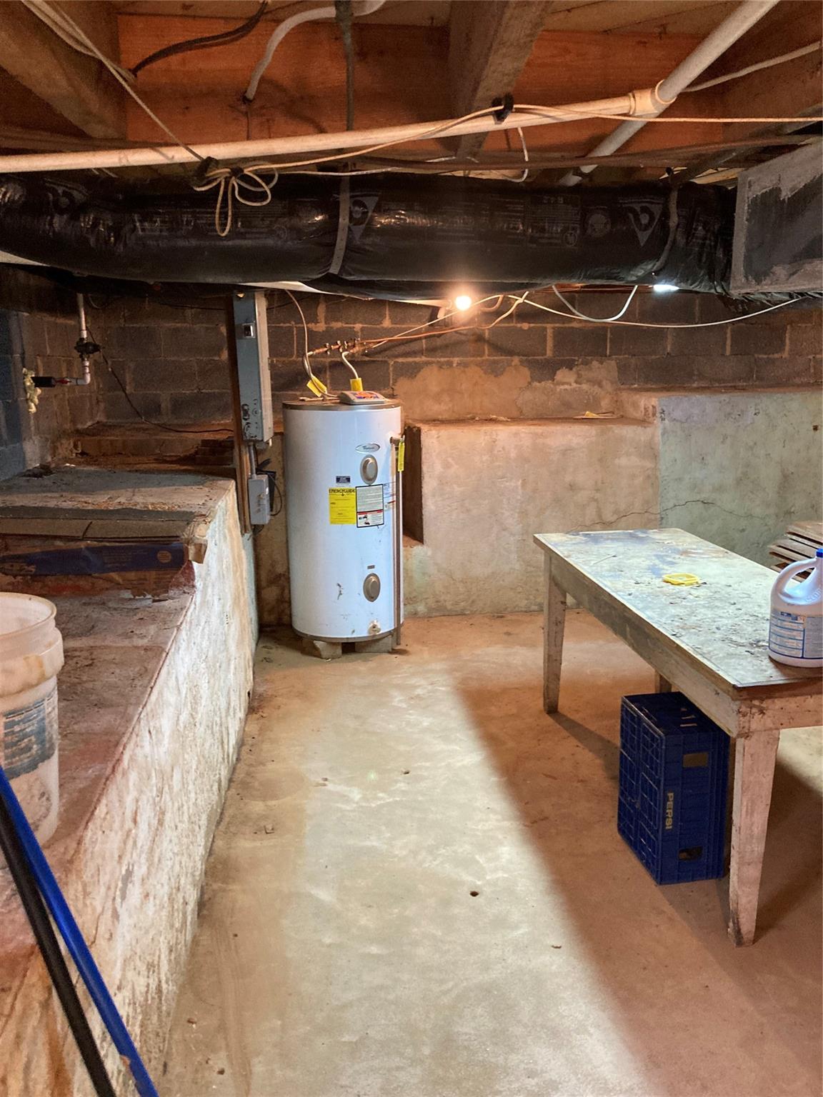 117 Water Filter Plant Road Morganton, NC 28655 - Photo 22 of 30 a utility room with stainless steel appliances wooden cabinet and view of the kitchen