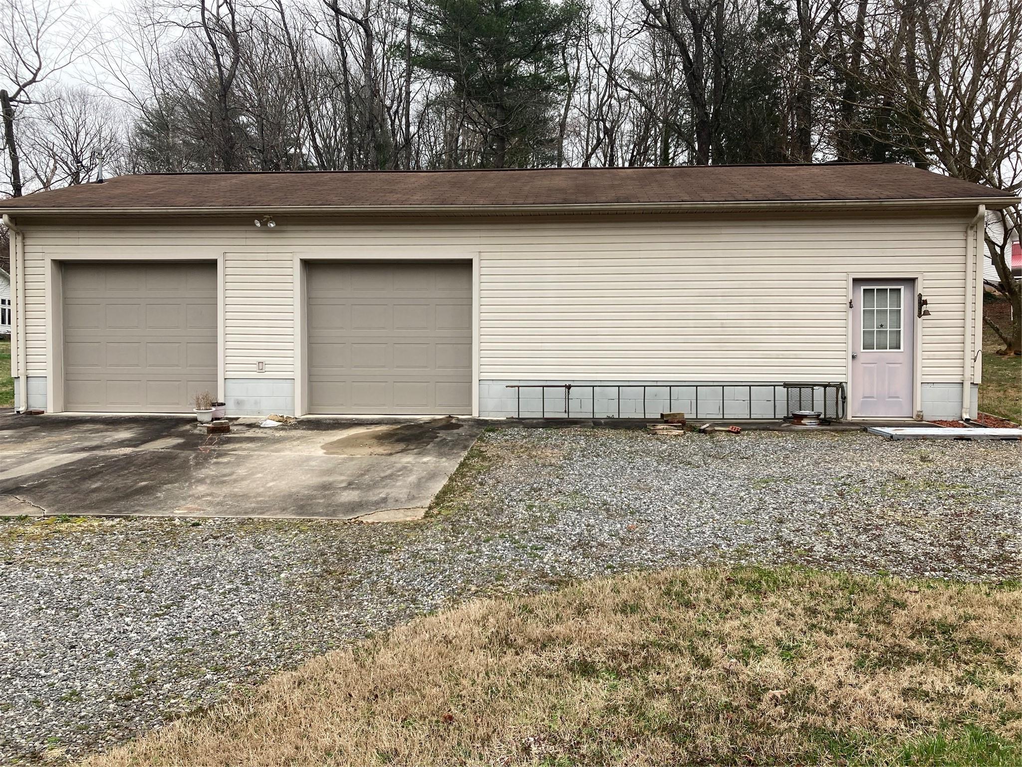 117 Water Filter Plant Road Morganton, NC 28655 - Photo 25 of 30 a view of a house with a yard