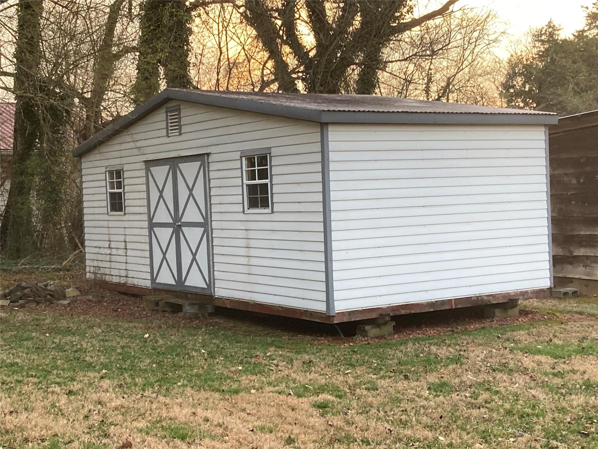 117 Water Filter Plant Road Morganton, NC 28655 - Photo 29 of 30 a view of a house with a yard and wooden fence