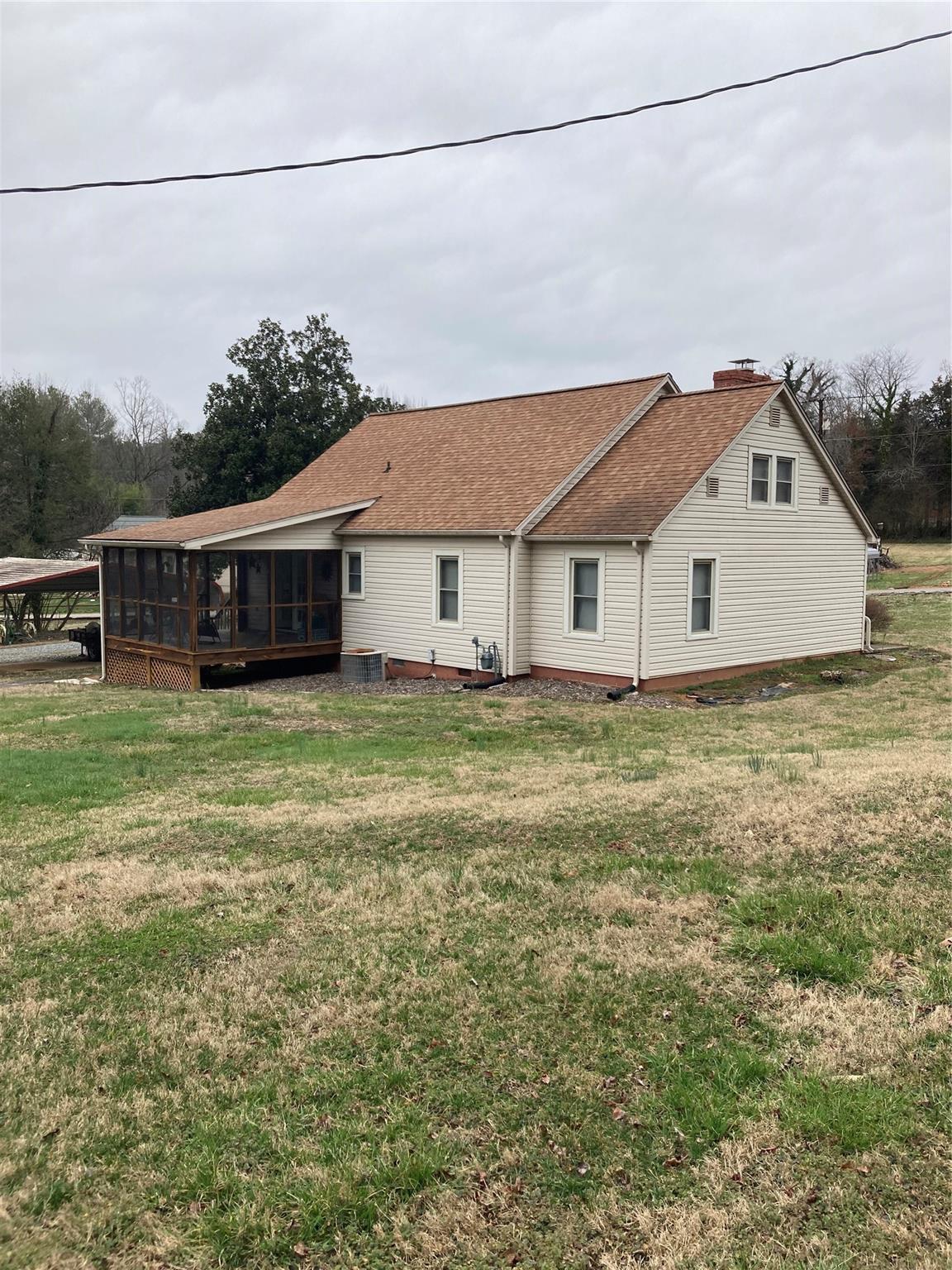 117 Water Filter Plant Road Morganton, NC 28655 - Photo 4 of 30 a house with a garden in front of it