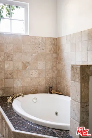 a bathroom with a bathtub