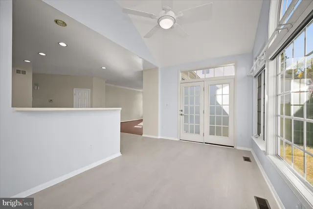 a kitchen with stainless steel appliances granite countertop a stove and a sink
