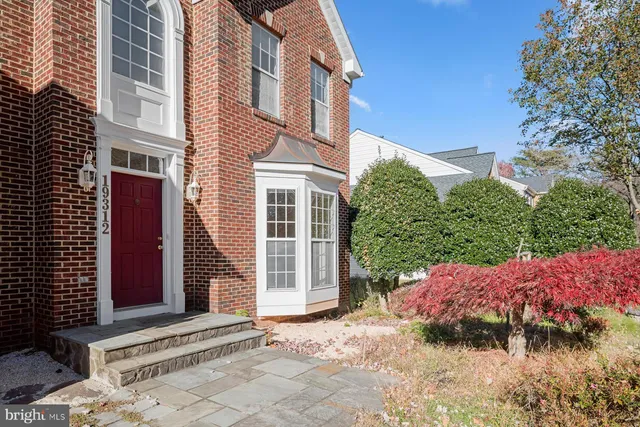 a view of a backyard with a table and chair