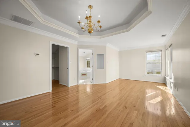 a view of a livingroom with wooden floor