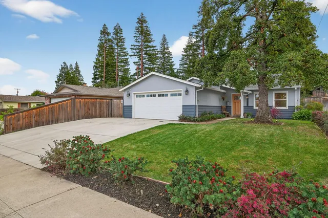 a house view with a garden space