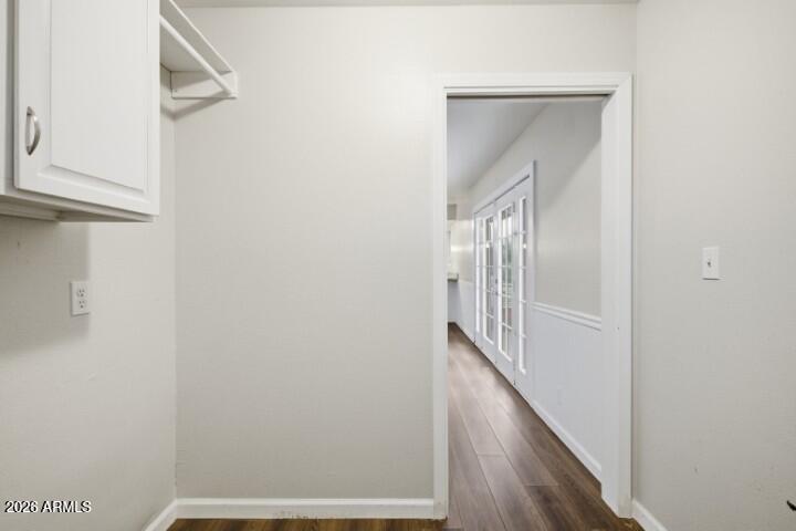 19402 West Lynx Road Buckeye, AZ 85326 - Photo 17 of 42 a view of a hallway with wooden floor and entryway