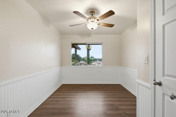 19402 West Lynx Road Buckeye, AZ 85326 - Photo 21 of 42 wooden floor in an empty room with a window