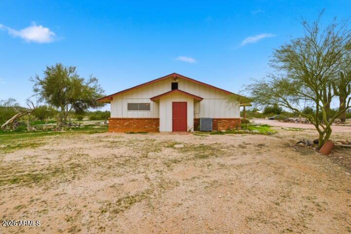 19402 West Lynx Road Buckeye, AZ 85326 - Photo 34 of 42 a view of a house with a yard