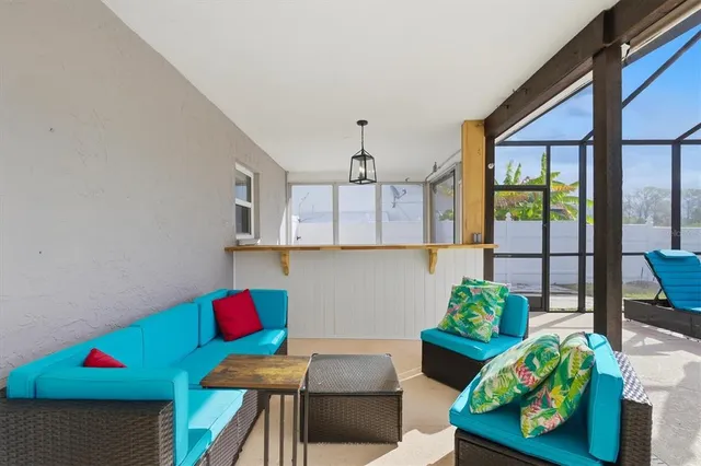 a view of a swimming pool with a patio