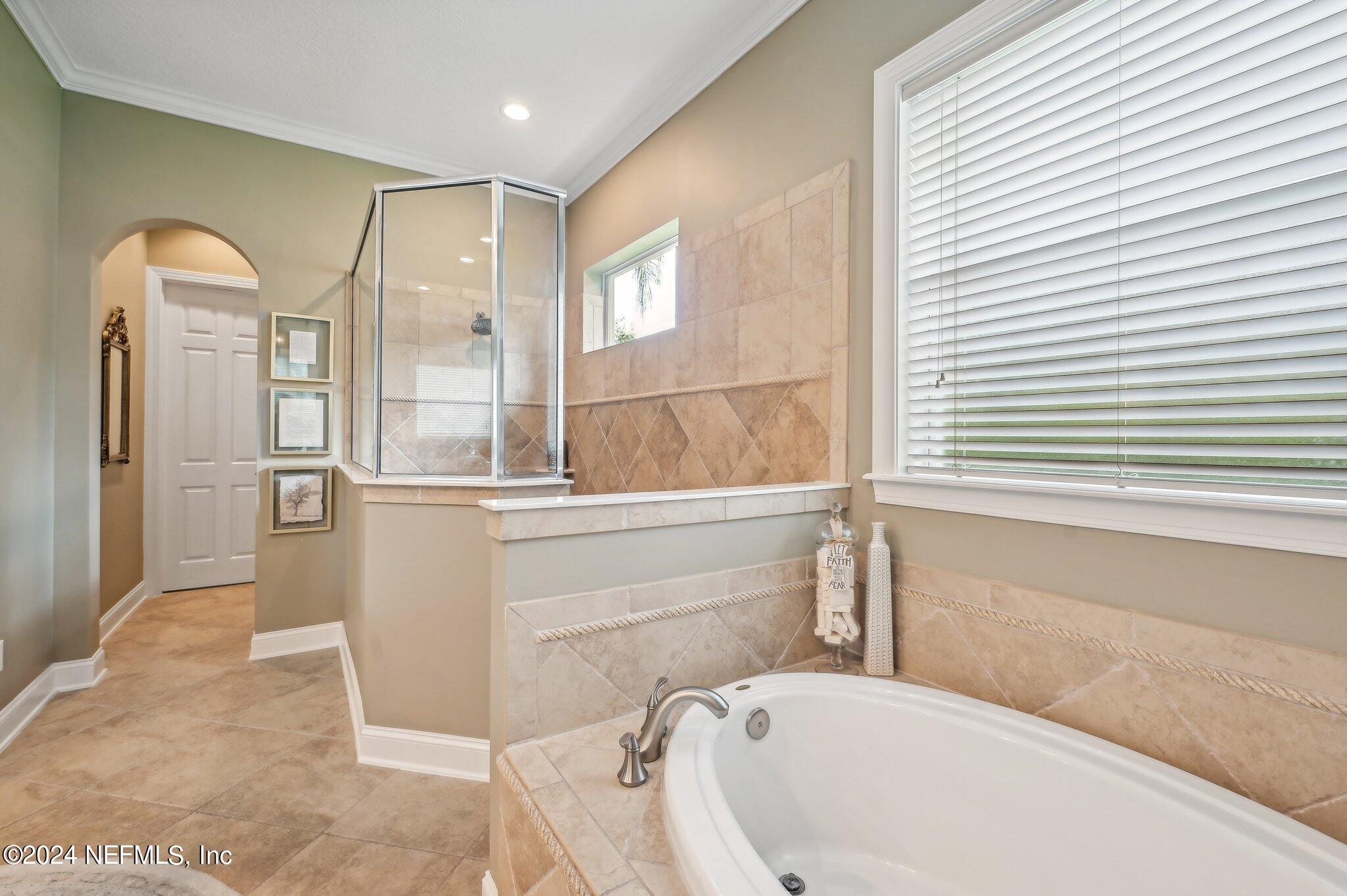 283 Stonewell Drive St. Johns, FL 32259 - Photo 32 of 72 Separate soaking tub and 2 closets